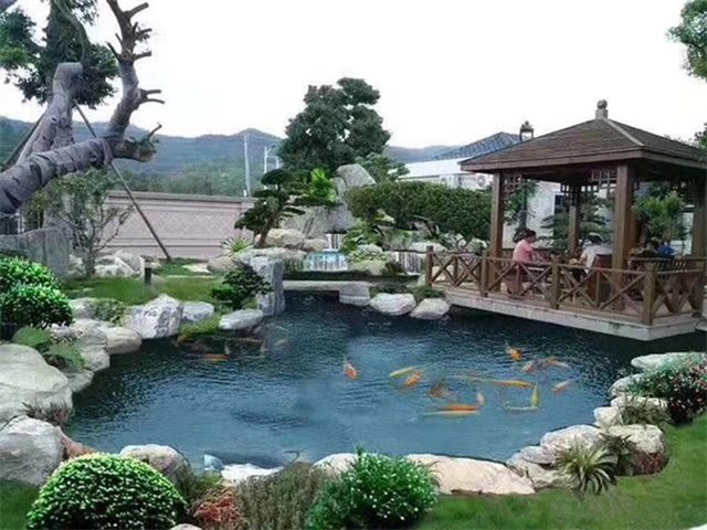 沭阳庭院鱼池假山设计
